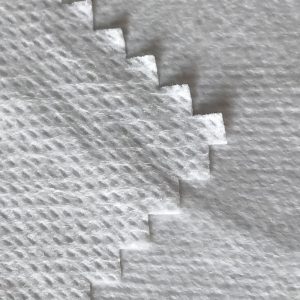 WF1 / O9TO5 SS + PTFE Tejido no tejido laminado con membrana transpirable lechosa de PTFE de tejido de traje de protección médica